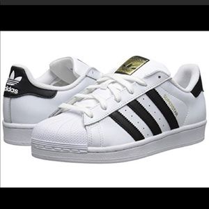 Adidas black and white superstar shoes